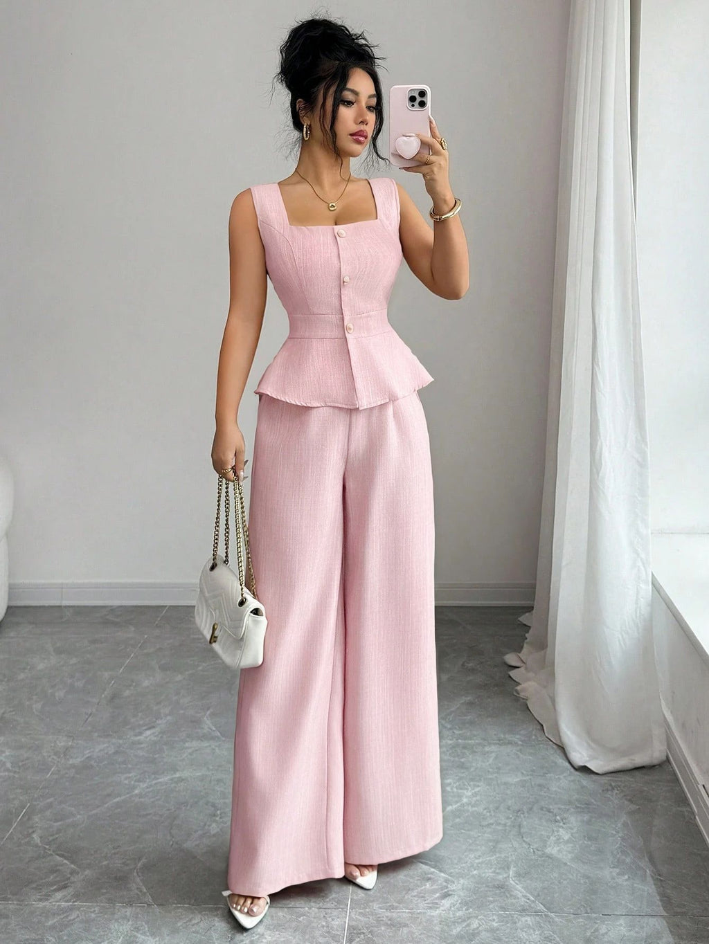 Two piece set of slim fit sleeveless top and pants